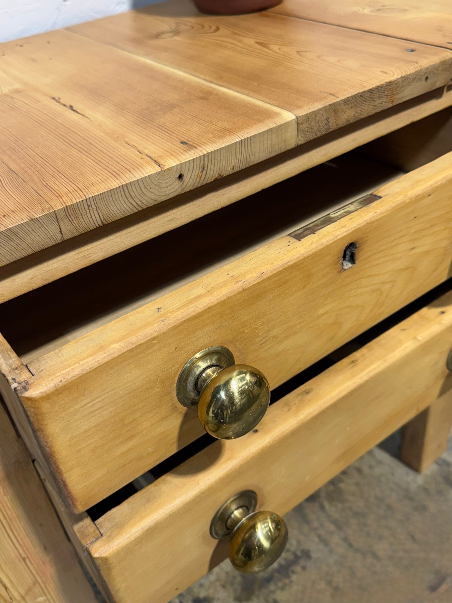 2 Drawer rustic pine table with brass handles